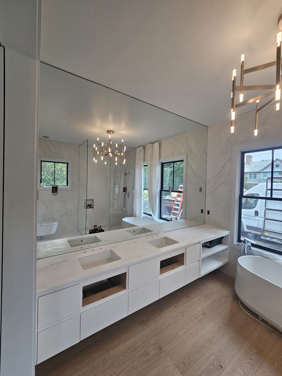 Custom mirror wall installation by ProForm
