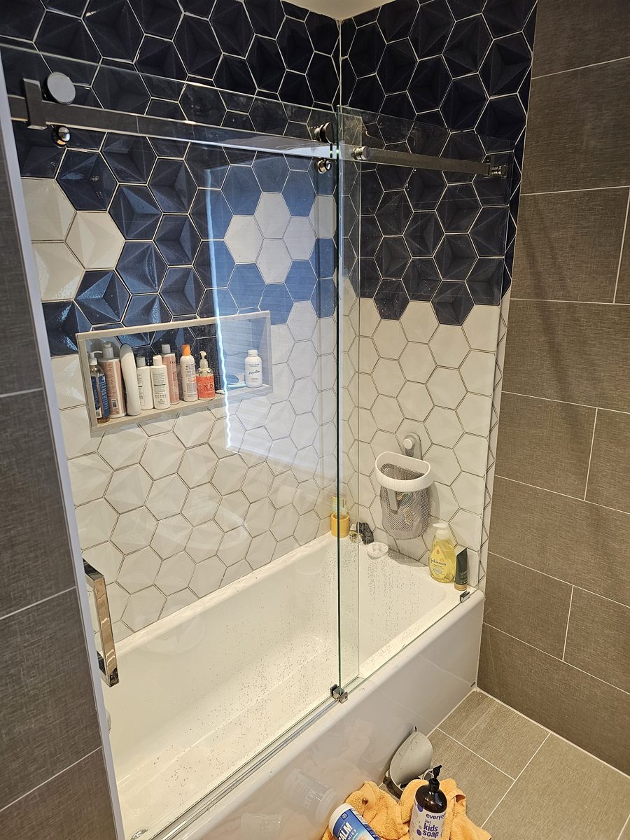 Frameless shower door installation by ProForm