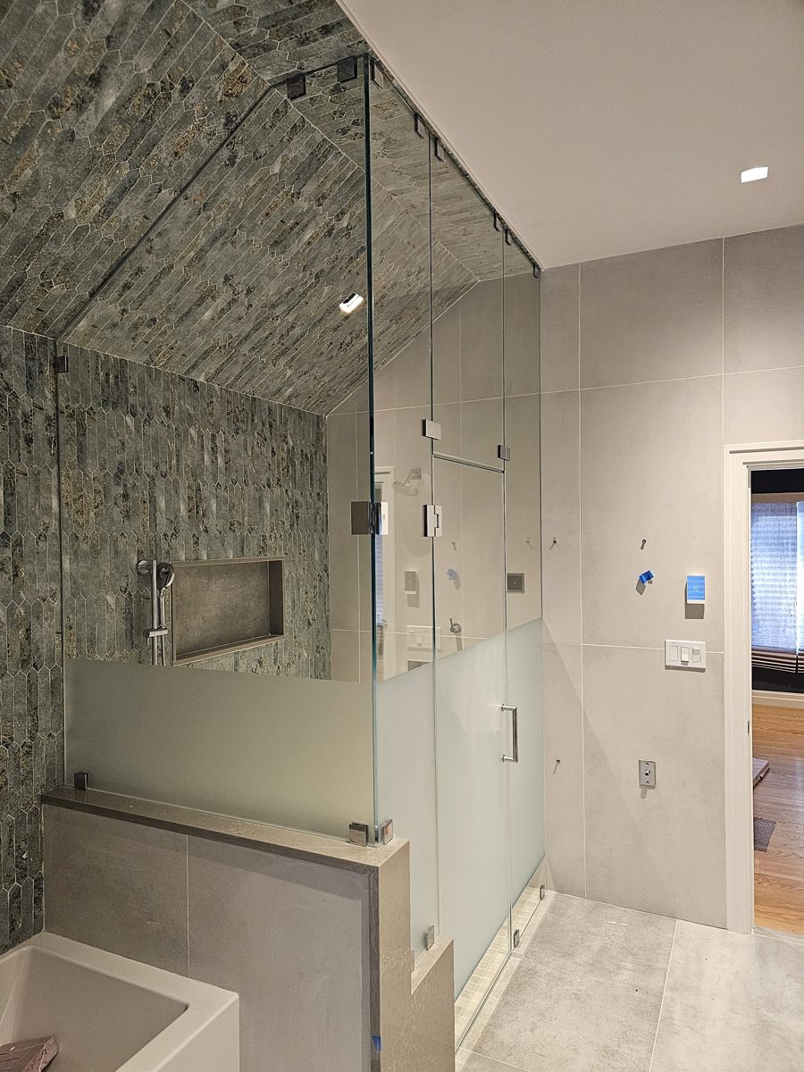Frameless shower door installation by ProForm