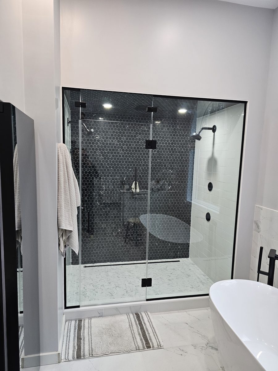 Frameless shower door installation by ProForm